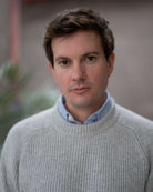 Model wearing a light grey paradaiza cashmere paradaiza knit and chinos 