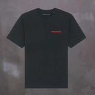 Black t-shirt with 'PARADAIZA' logo on a dark background