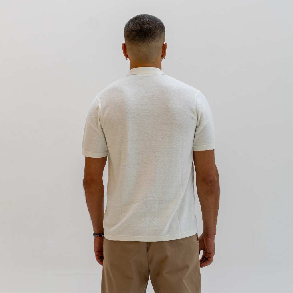 model wears a  Paradaiza Ivory  short-sleeve knitted polo shirt