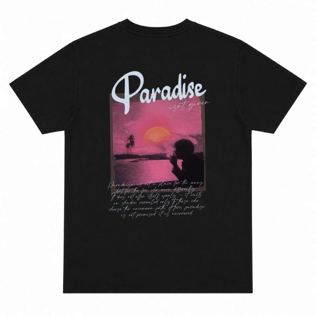 Black t-shirt with a sunset design and 'Paradise' text on a white background