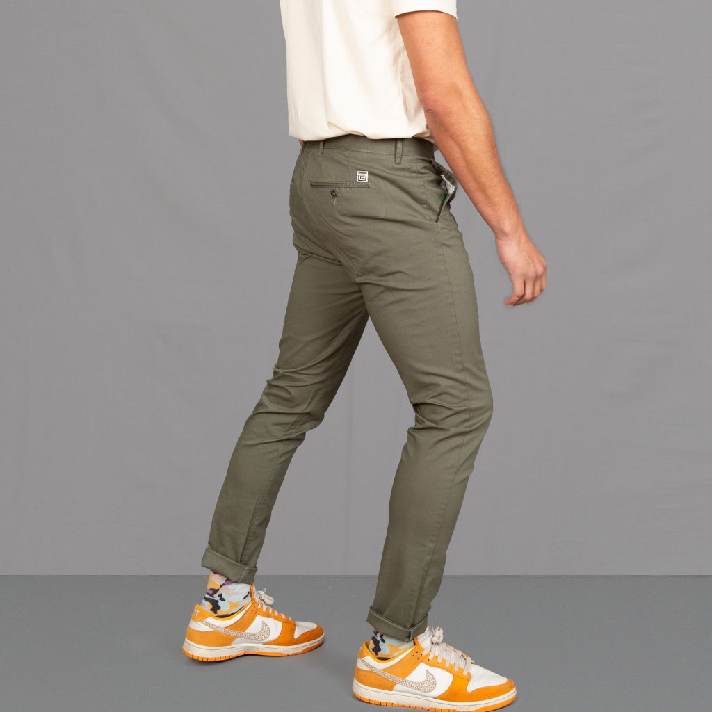 model wears para-daiza tee with core chinos and nike