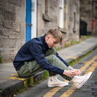 model wears para-daiza khaki cargo pant with converse in stockbridge 