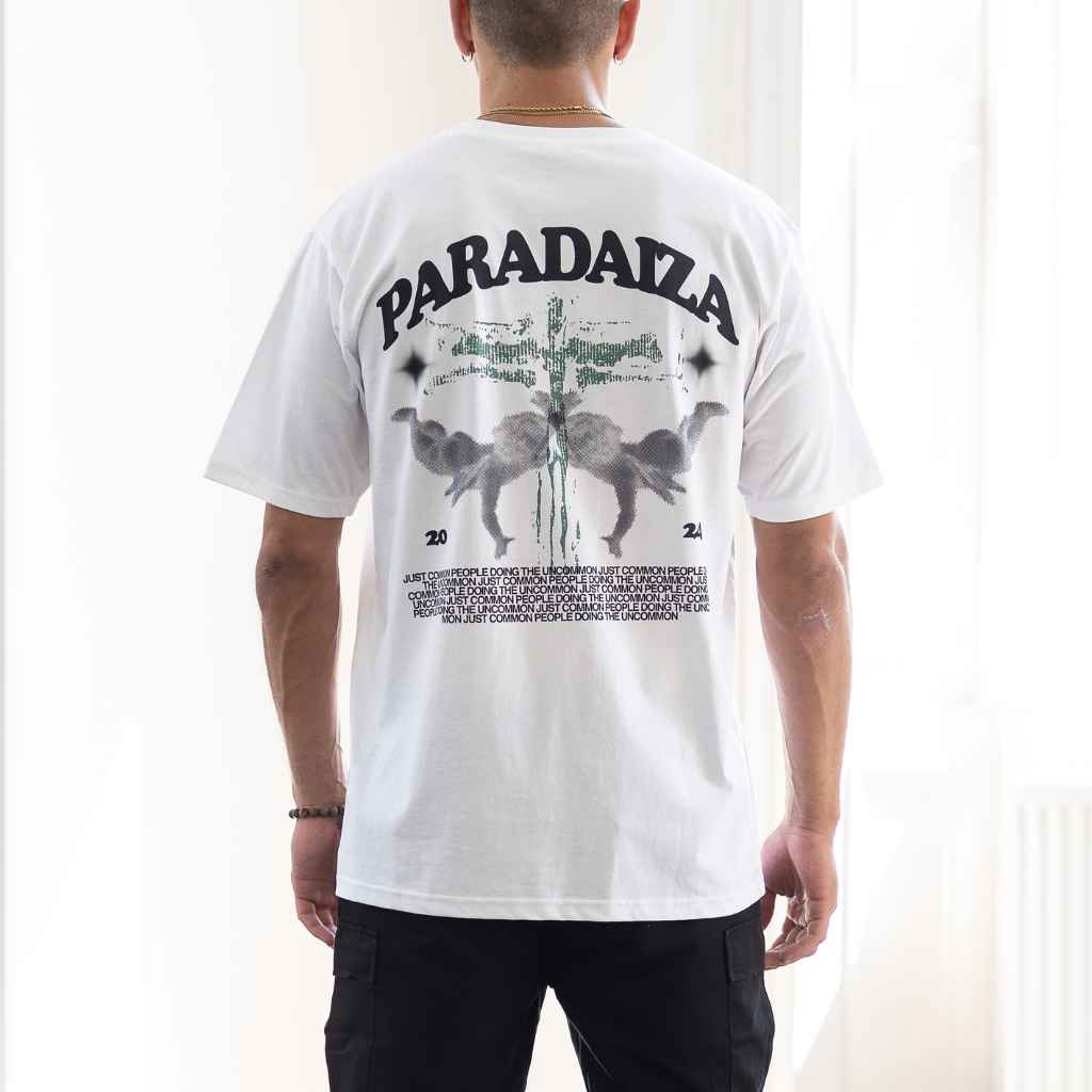 model wears a paradaiza white tee with cherubs graphic 