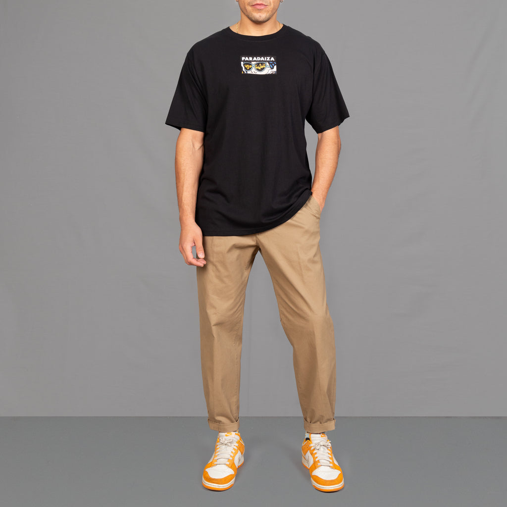 oversized black tee with seek cartoon graphic