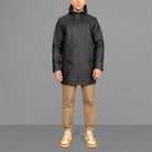 model wears fully waterproof black para-daiza parka jacket