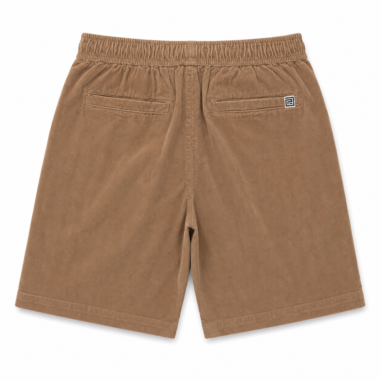 A pair of brown corduroy shorts with an elastic waistband, two back patch pockets, and a small square brand label on the right pocket, shown against a plain white background.