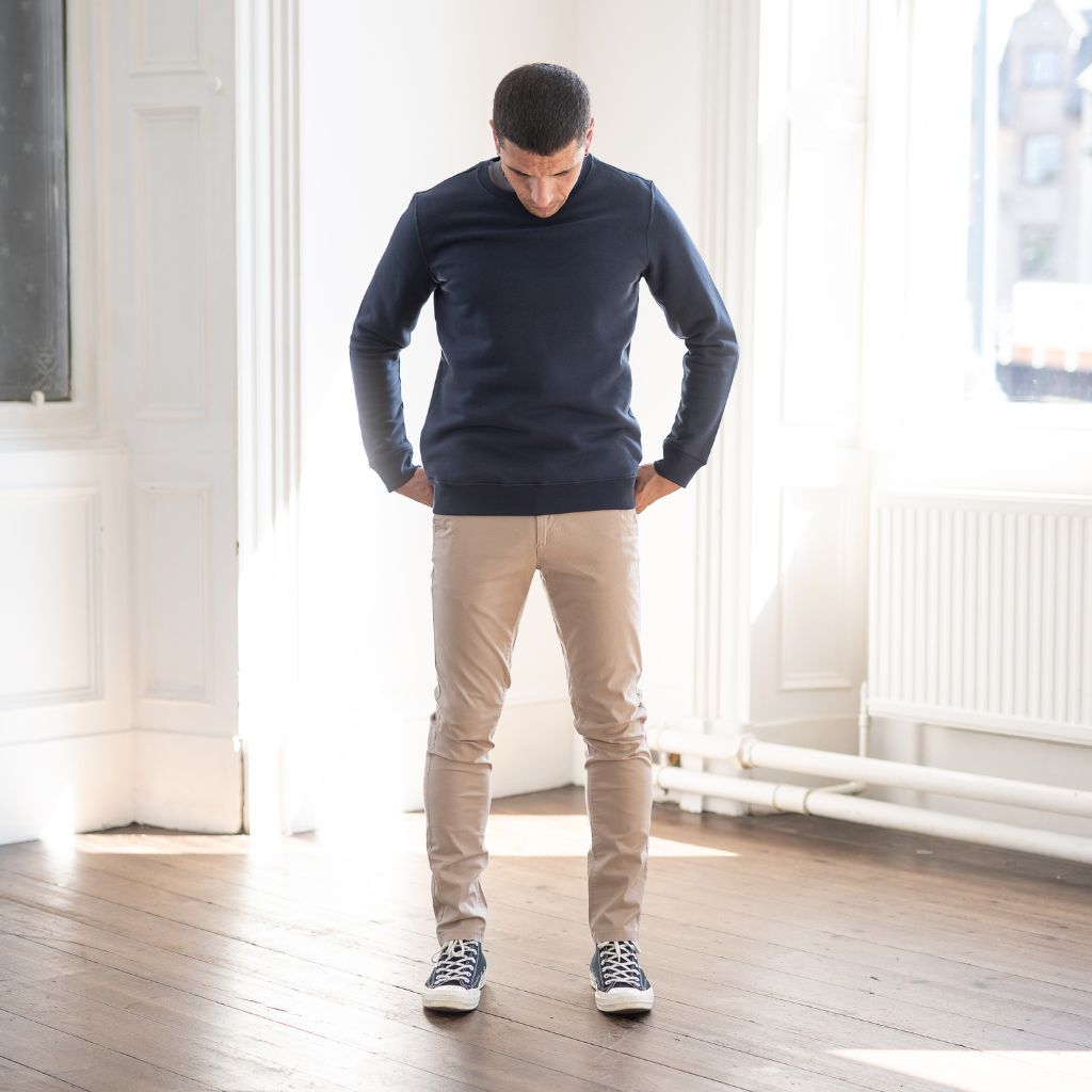 model wears navy crew sweat  and core chino