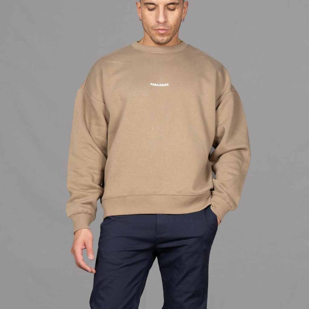 Model wears Para-Daiza Oversized Tan Crew neck sweatshirt  superflex chino