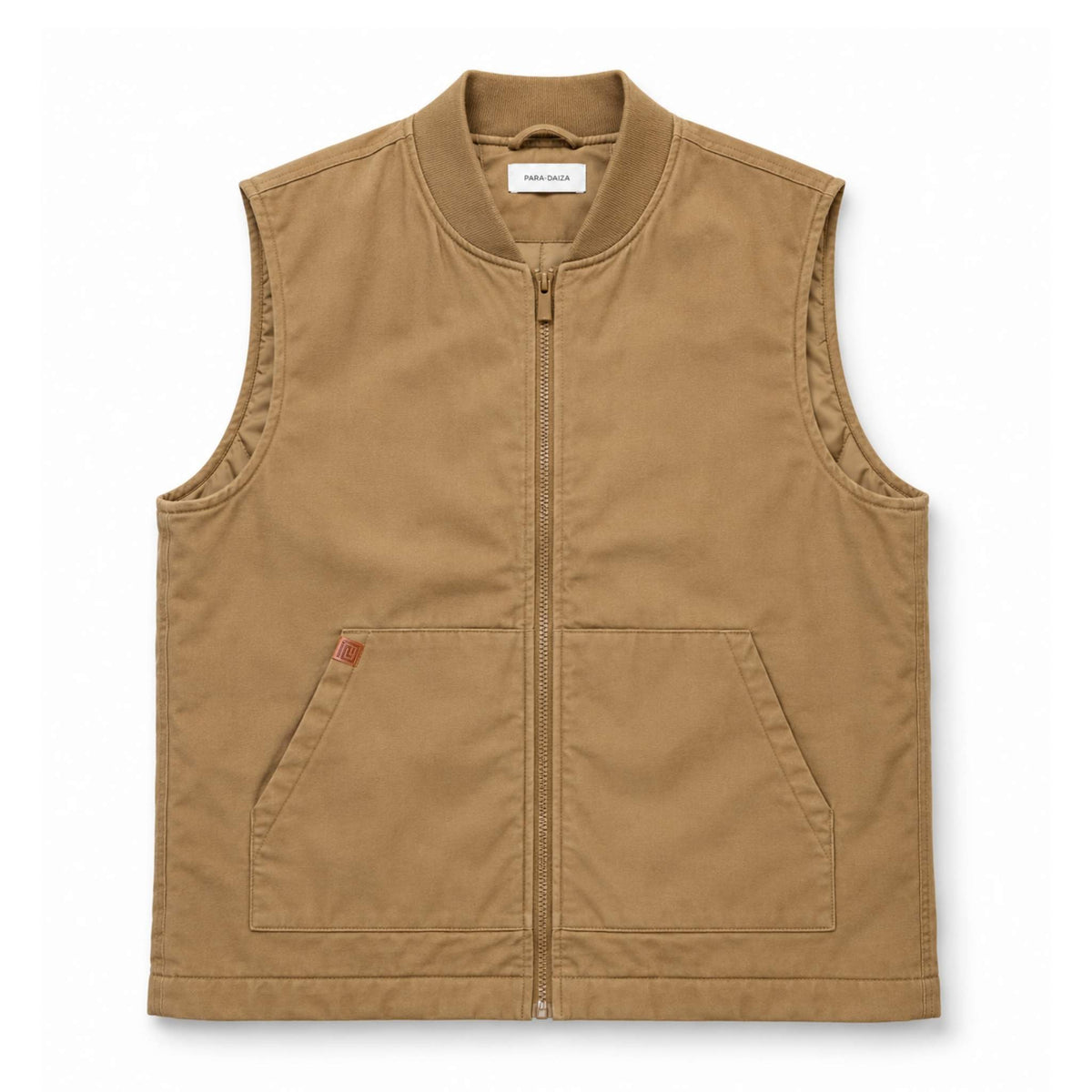 A tan zip-up vest with a stand collar, two front patch pockets, and a small red brand tab on the left pocket, shown flat against a white background.