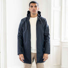 model wears paradaiza parka navy