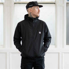 model wears paradaiza wind runner  jacket and cap