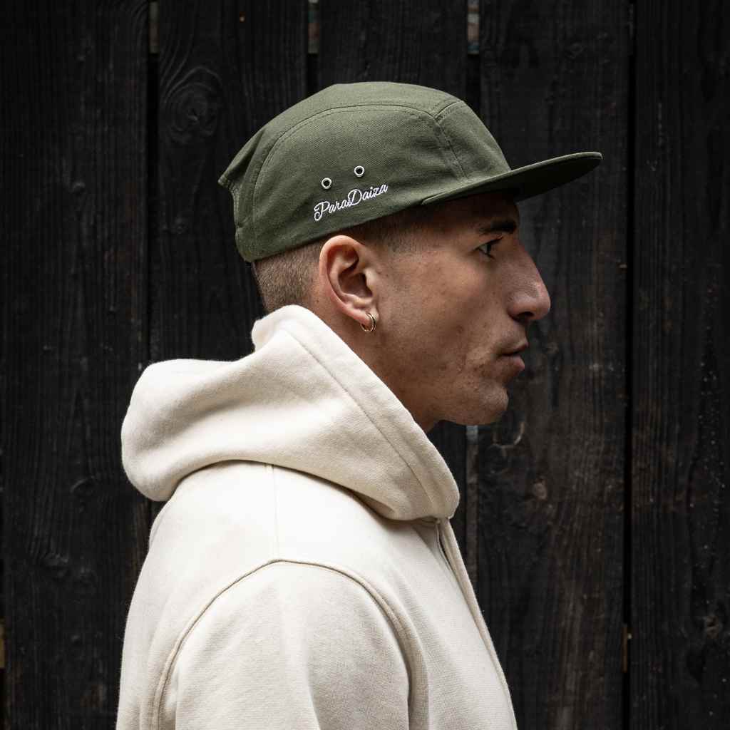 model wears paradaiza core five panel khaki cap