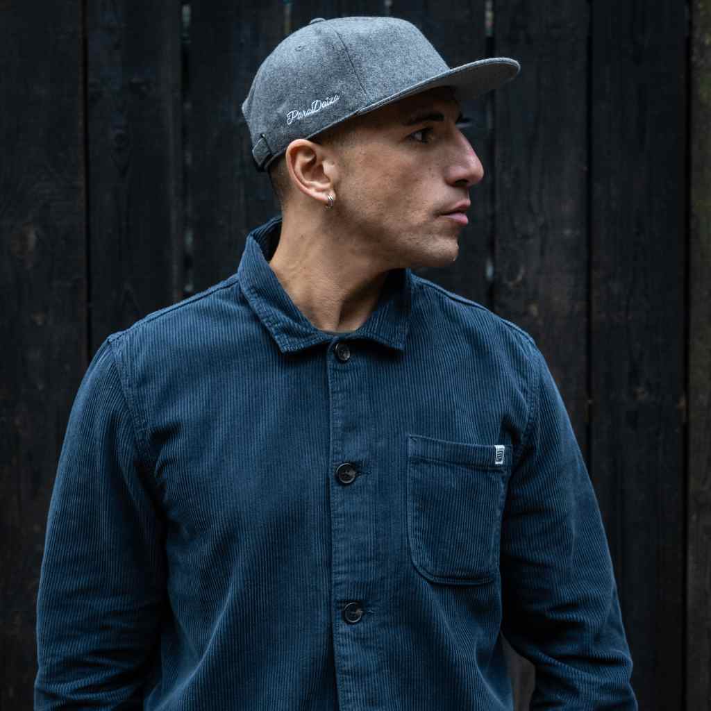 model wears paradaiza classic grey cap with cord overshirt