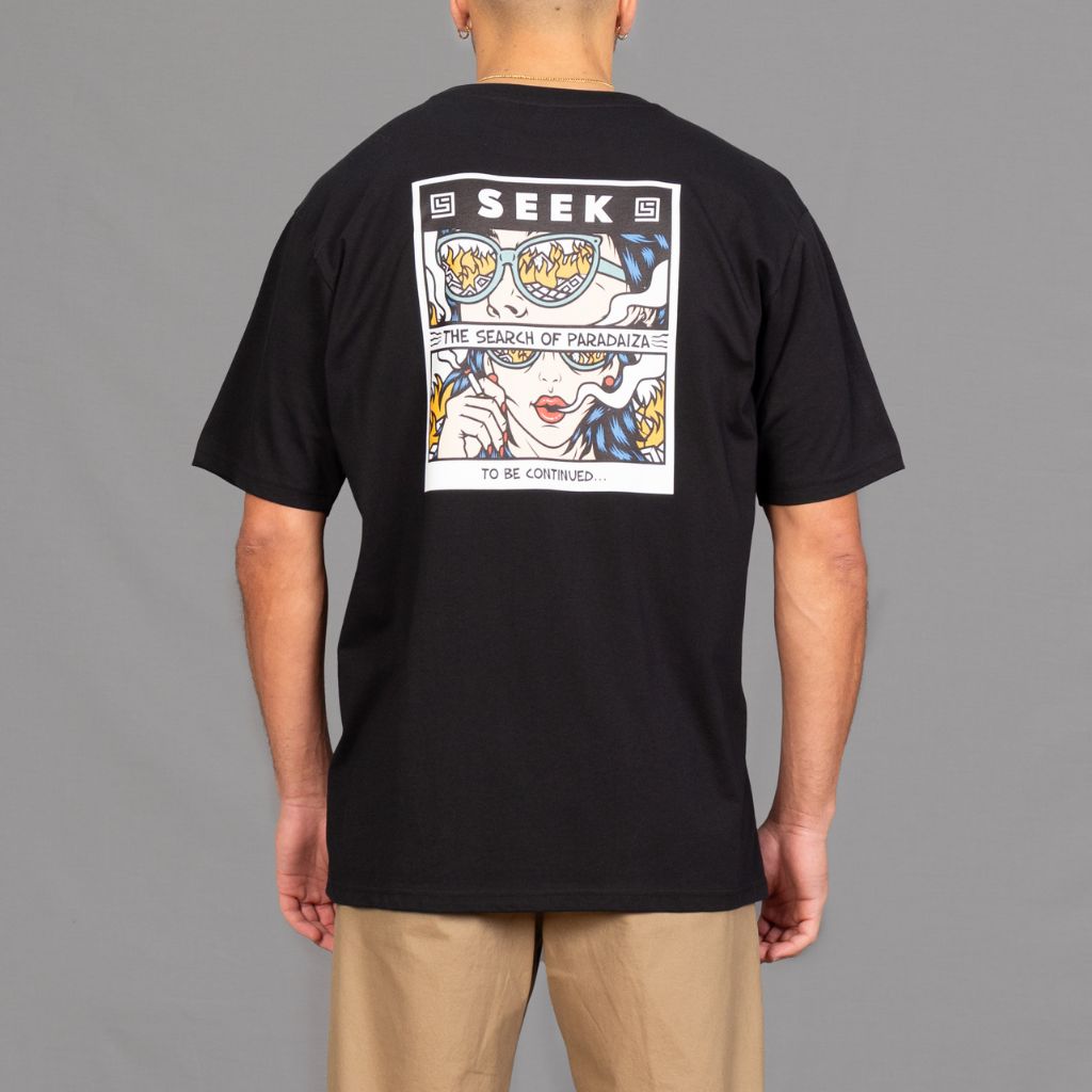 oversized black tee with seek cartoon graphic