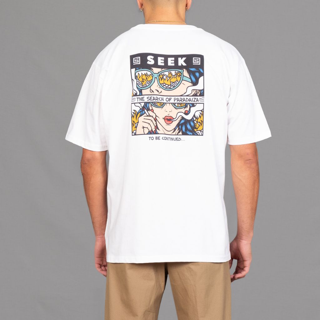 Oversized white tee with seek cartoon graphic