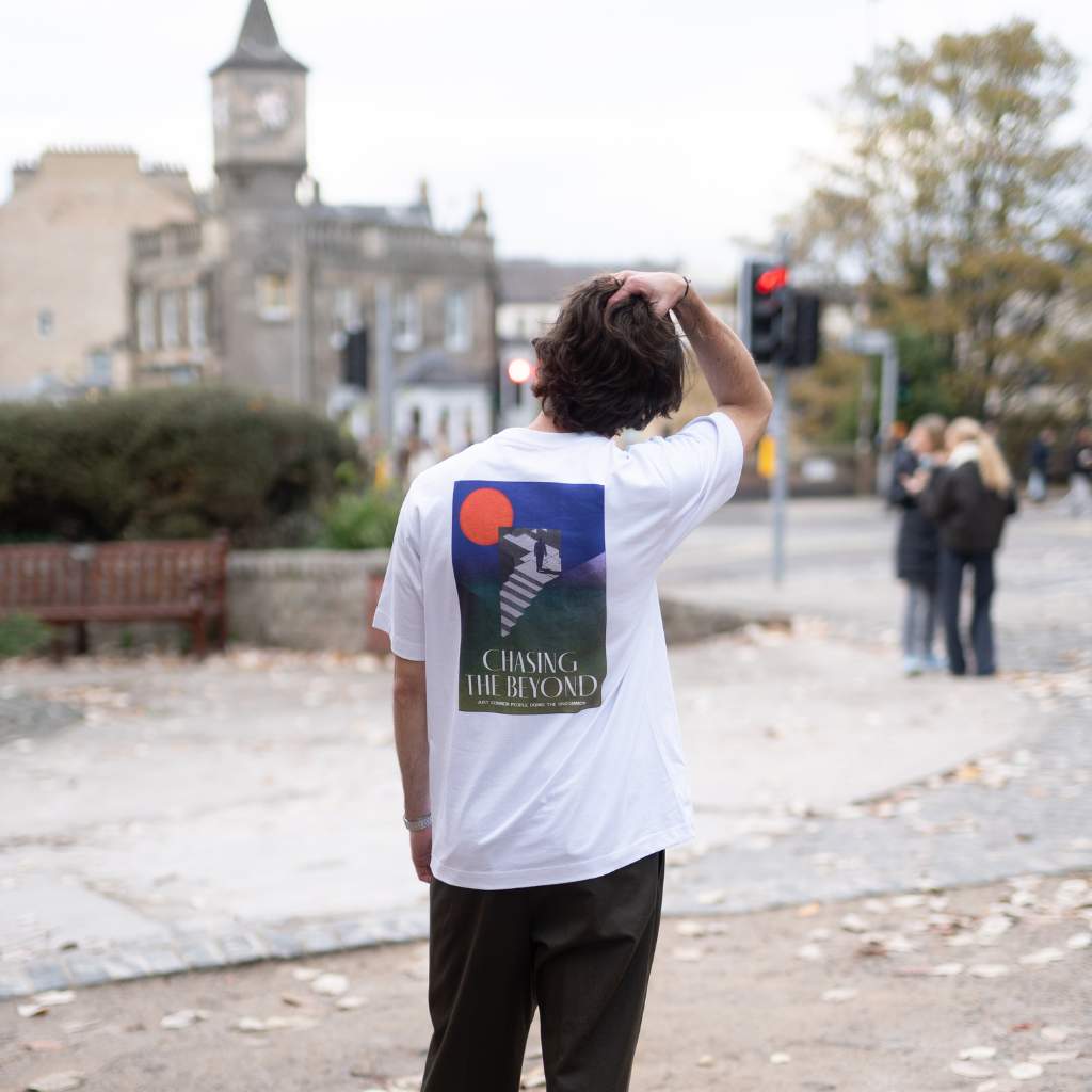 Paradaiza White t-shirt with a graphic design on model