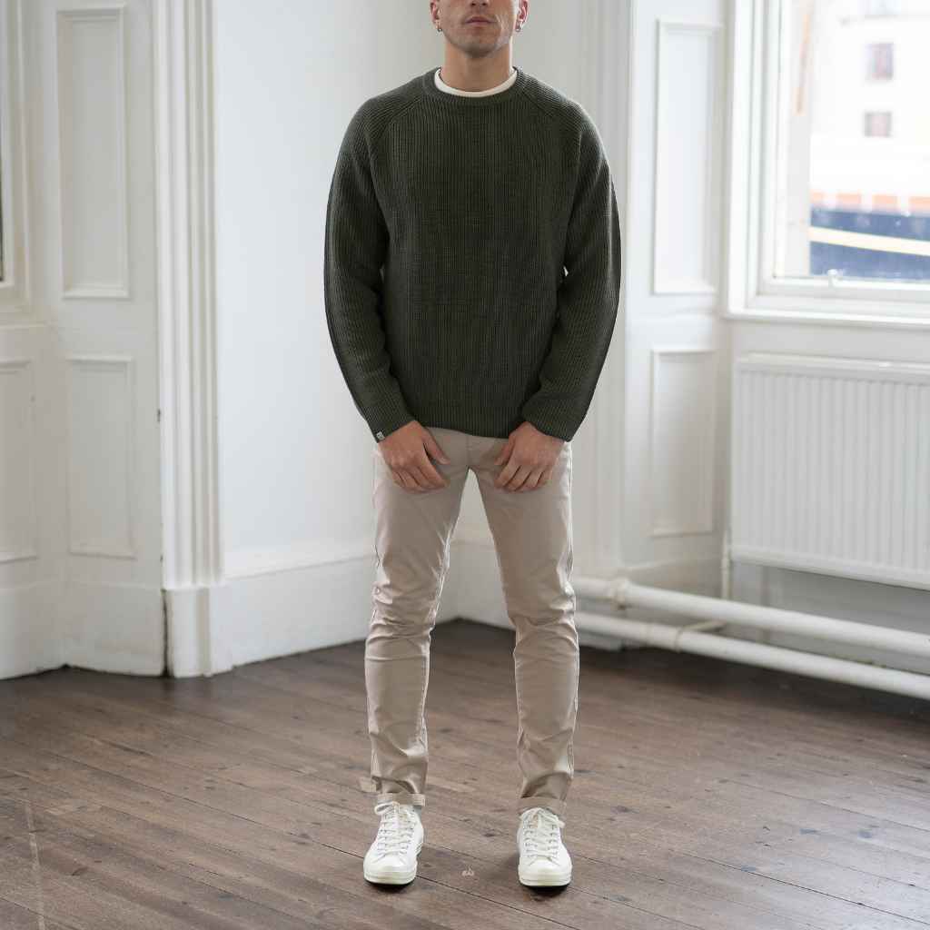 model wears paradaiza fisherman knit in khaki