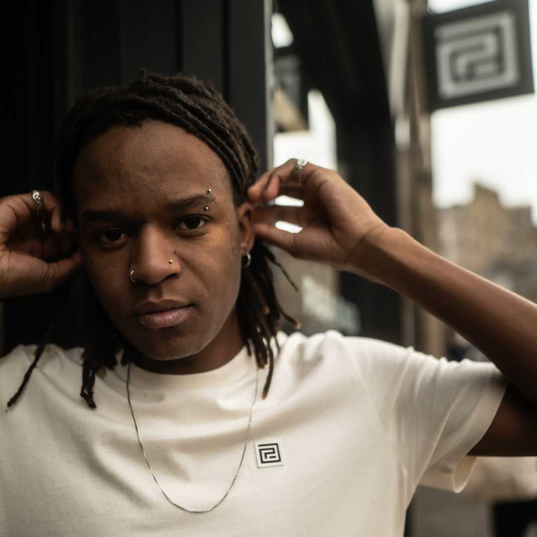 model wears paradaiza maze crew tee natural