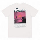 White paradiza t-shirt with a graphic of a sunset over water and the word 'Paradise' on a white background.