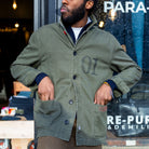 model wearing paradaiza khaki worker jacket out side the paradaiza 