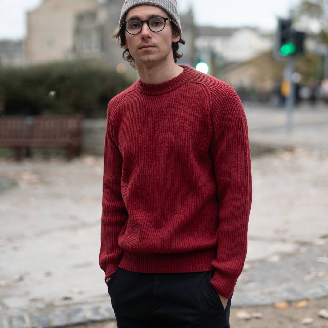 man wears paradaiza red fisherman knit in stockbridge 