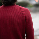 man wears paradaiza red fisherman knit in stockbridge 
