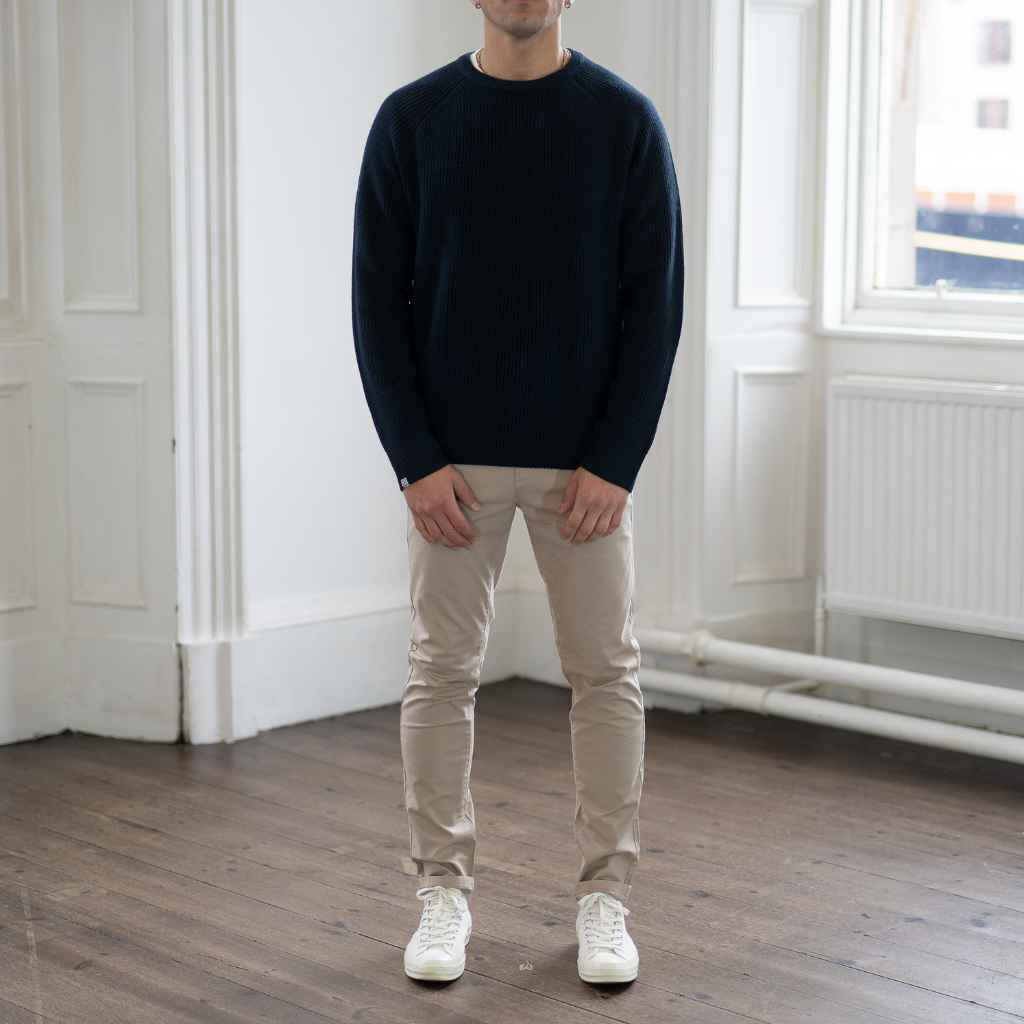 model wears paradaiza fisherman knit