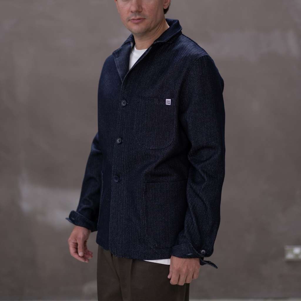 Model  wearing a dark denim paradaiza  jacket 