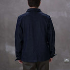 Model  wearing a dark denim paradaiza  jacket 