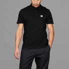 The model wears Para-Daiza Black Core Polo Shirt, pinch chino 